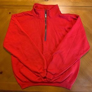 Red quarter-zip pull over